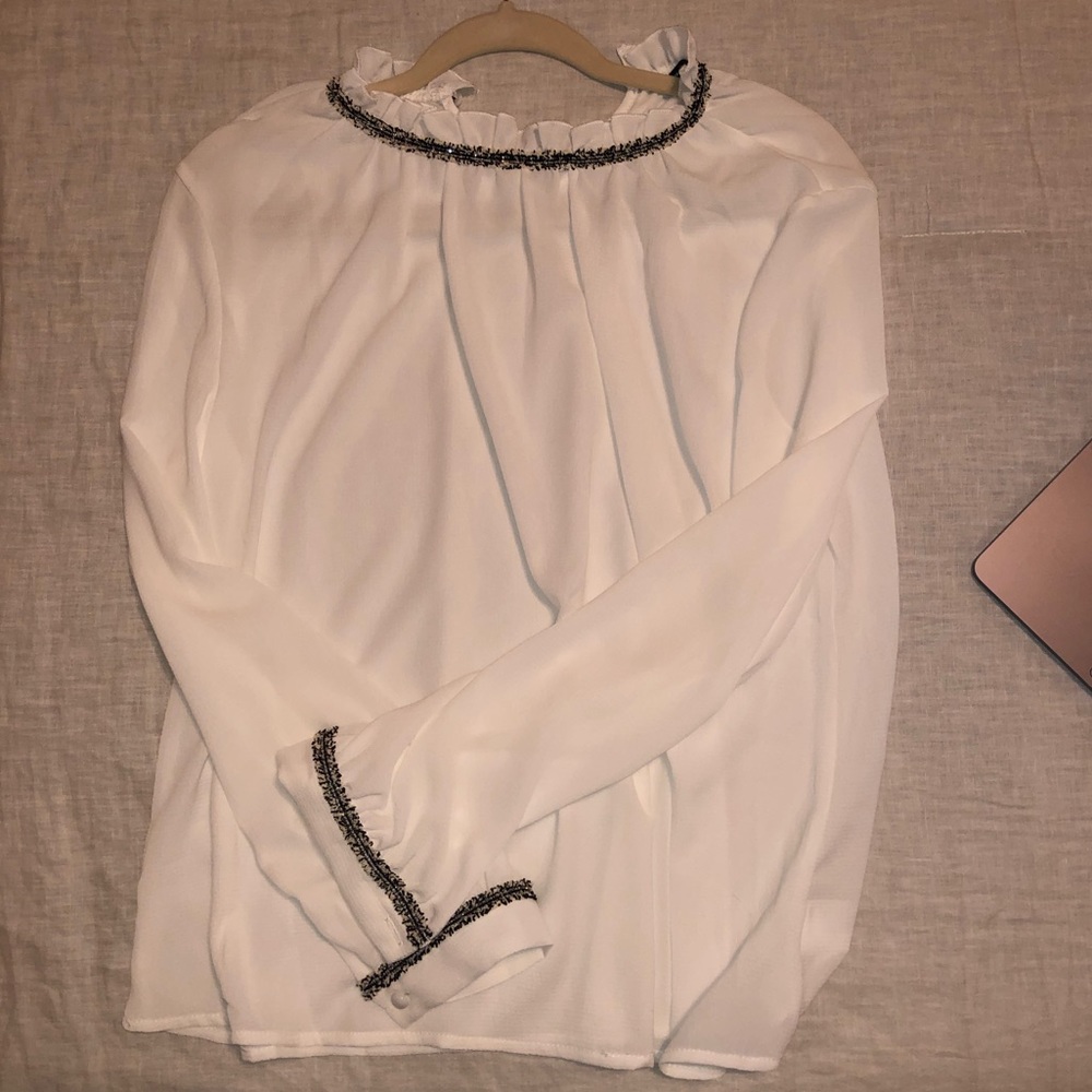 White sheer top with fringe detail